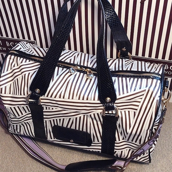 Henri Bendel Disturbed Stripe weekender with lock - Picture 7 of 16
